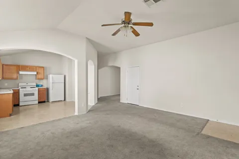 a view of a livingroom with a ceiling fan