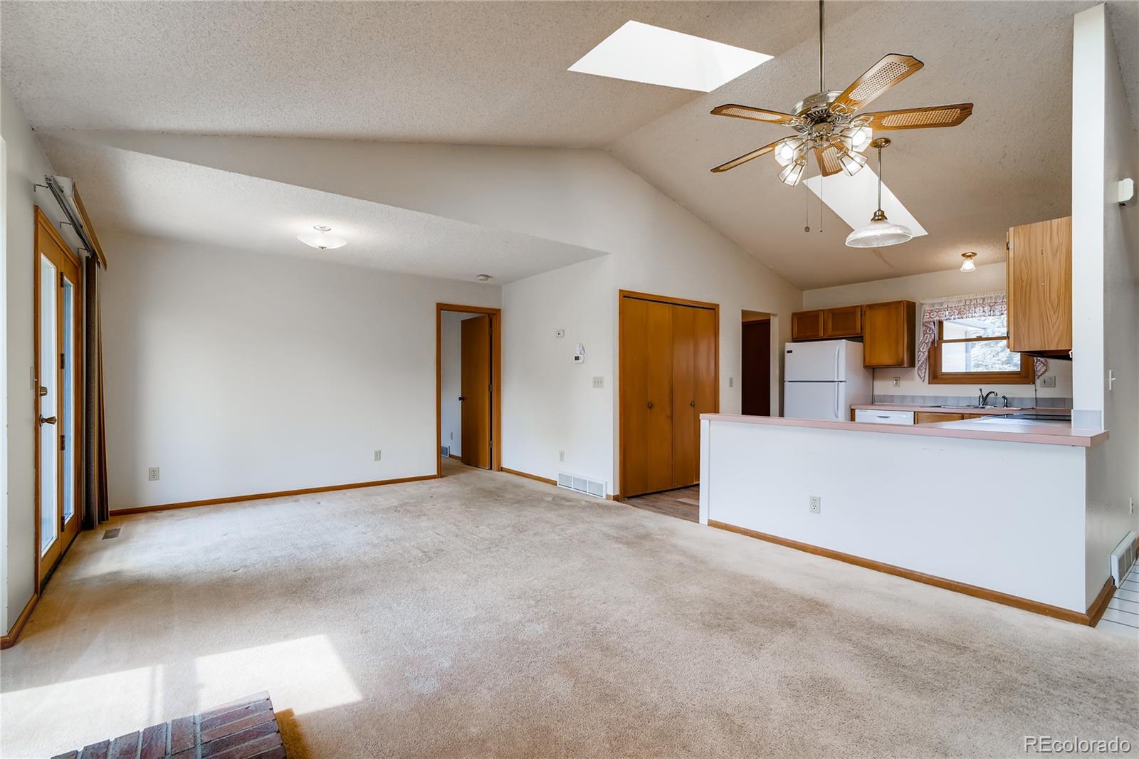 730 Douglas Place Berthoud, CO 80513 - Photo 7 of 28 a view of an empty room with a window