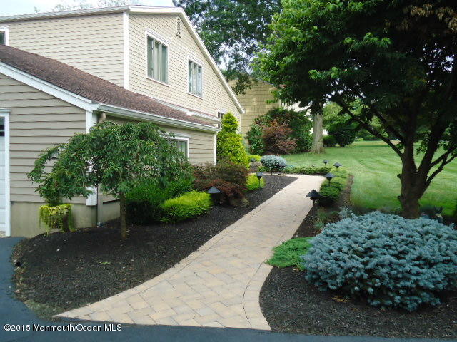 129 Ballantine Road Middletown, NJ 07748 - Photo 3 of 33 a view of a back yard of the house
