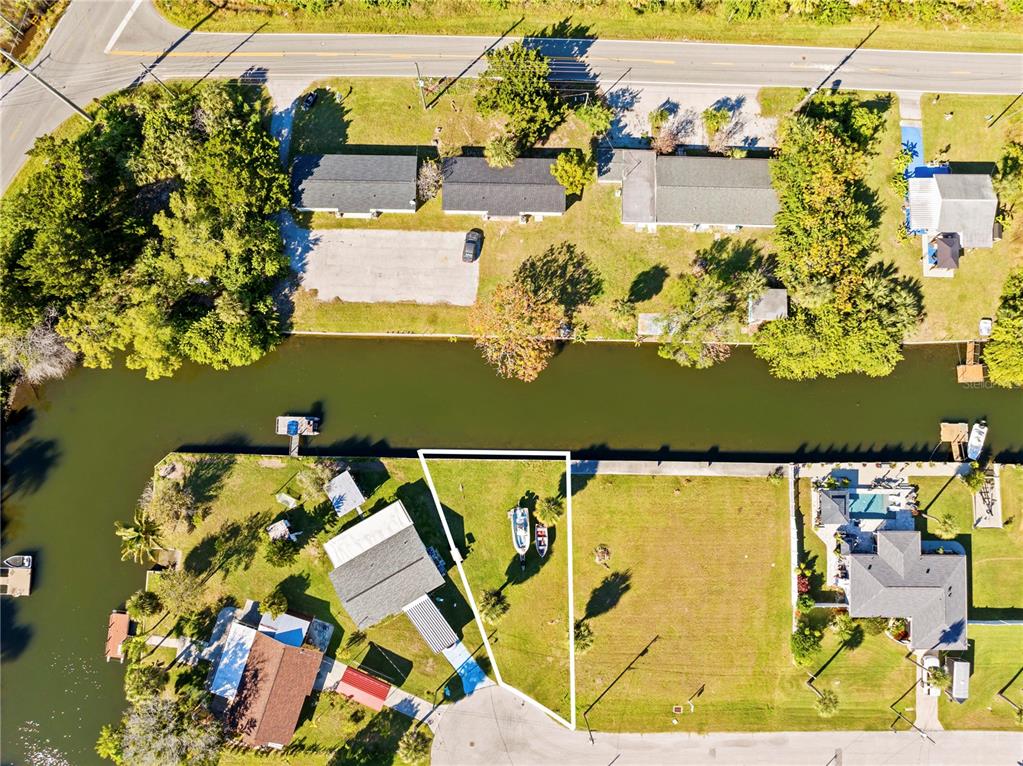 0 Sheepshead Drive Hudson, FL 34667 - Photo 3 of 9 an aerial view of a house with a lake view