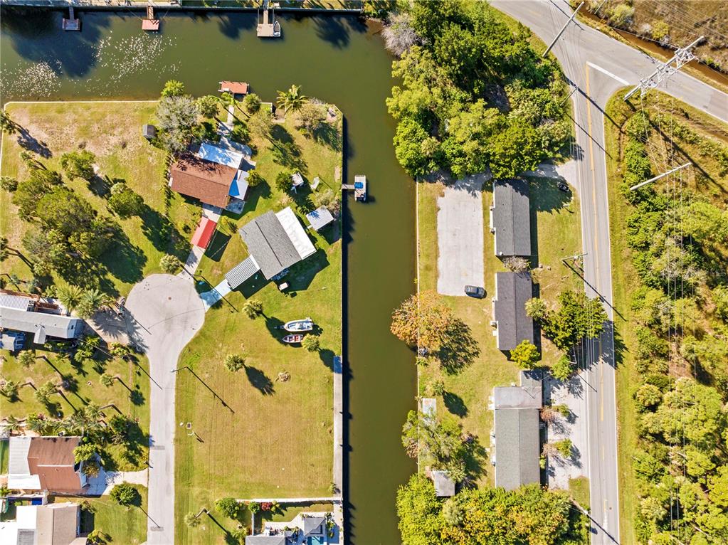 0 Sheepshead Drive Hudson, FL 34667 - Photo 4 of 9 an aerial view of a house with a yard swimming pool and outdoor space