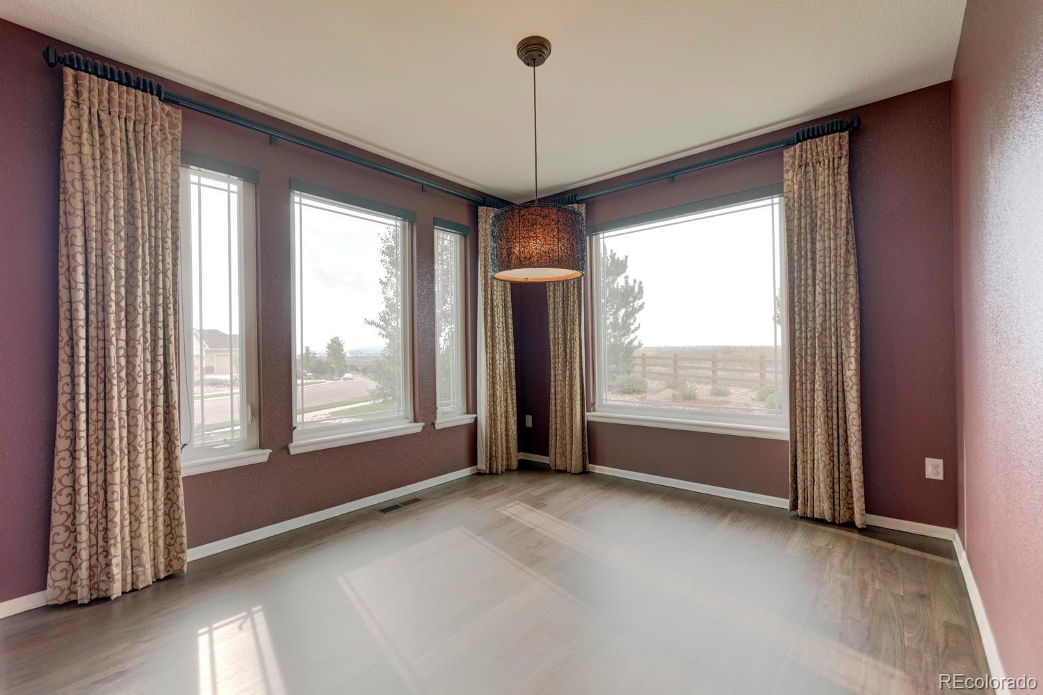 4939 Silver Feather Circle Broomfield, CO 80023 - Photo 12 of 35 a view of an empty room with a window
