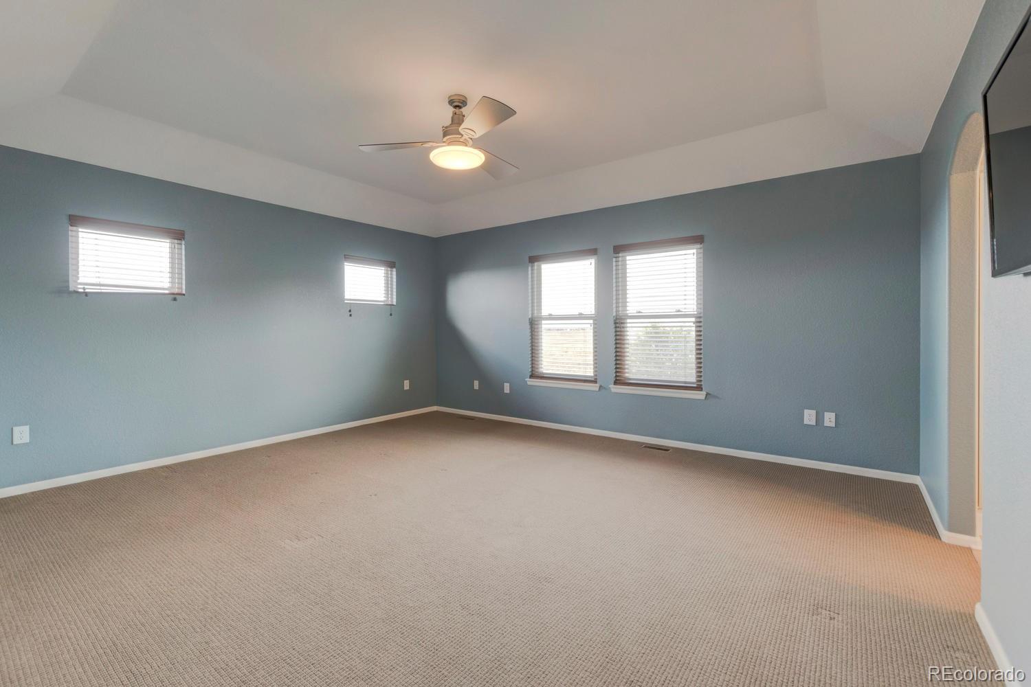 4939 Silver Feather Circle Broomfield, CO 80023 - Photo 13 of 35 an empty room with a window