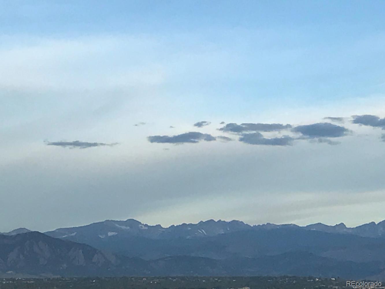 4939 Silver Feather Circle Broomfield, CO 80023 - Photo 2 of 35 a view of a mountain