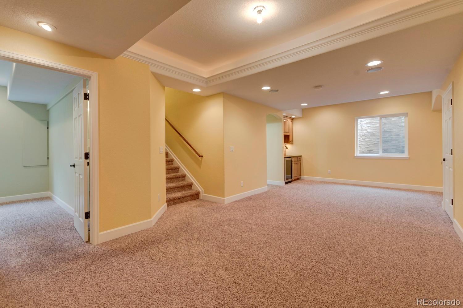 4939 Silver Feather Circle Broomfield, CO 80023 - Photo 24 of 35 a view of an empty room with a window