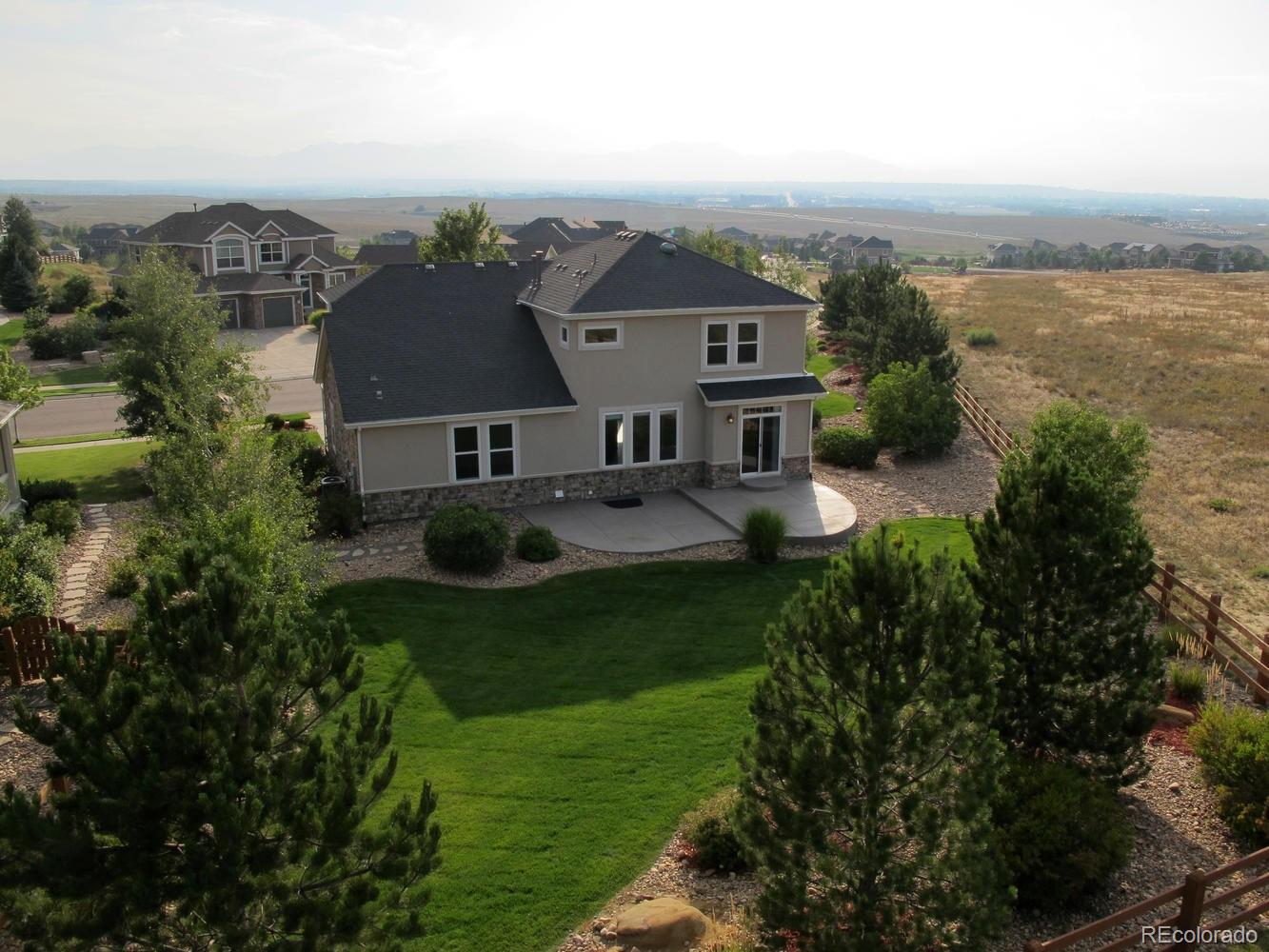 4939 Silver Feather Circle Broomfield, CO 80023 - Photo 31 of 35 an aerial view of a house with outdoor space and street view
