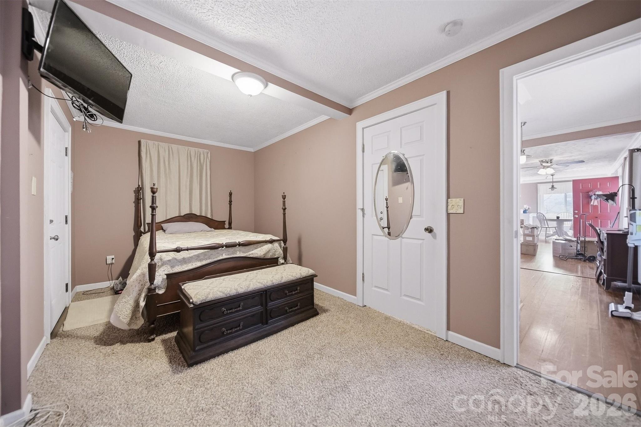 621 Wildlife Lake Road Old Fort, NC 28762 - Photo 17 of 35 a bedroom with bed and gym equipment