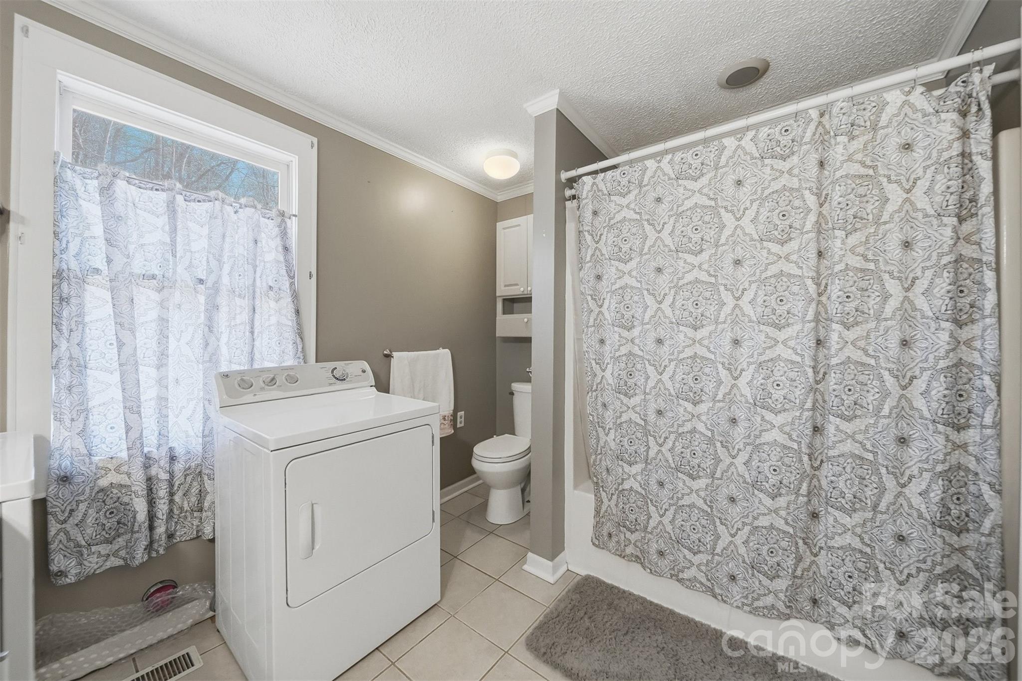 621 Wildlife Lake Road Old Fort, NC 28762 - Photo 19 of 35 a bathroom with a granite countertop sink and a toilet