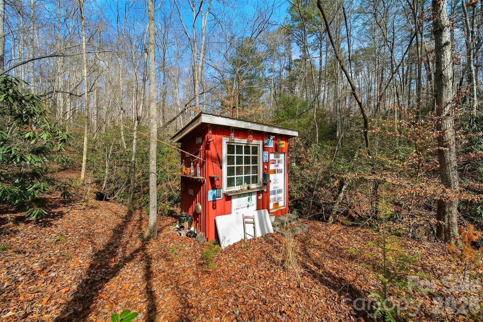 621 Wildlife Lake Road Old Fort, NC 28762 - Photo 22 of 35 front view of a house with a yard