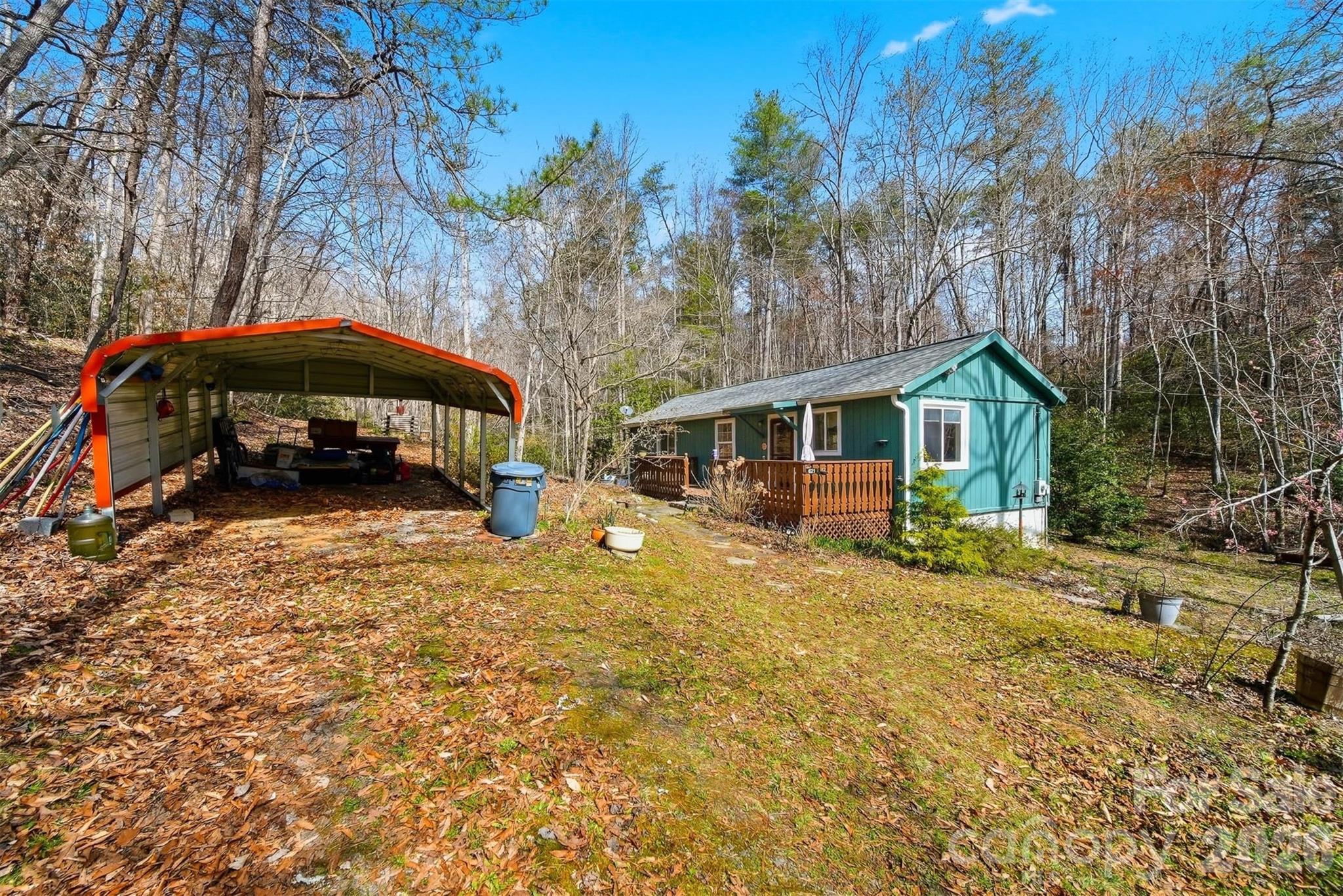 621 Wildlife Lake Road Old Fort, NC 28762 - Photo 24 of 35 a front view of a house with a yard