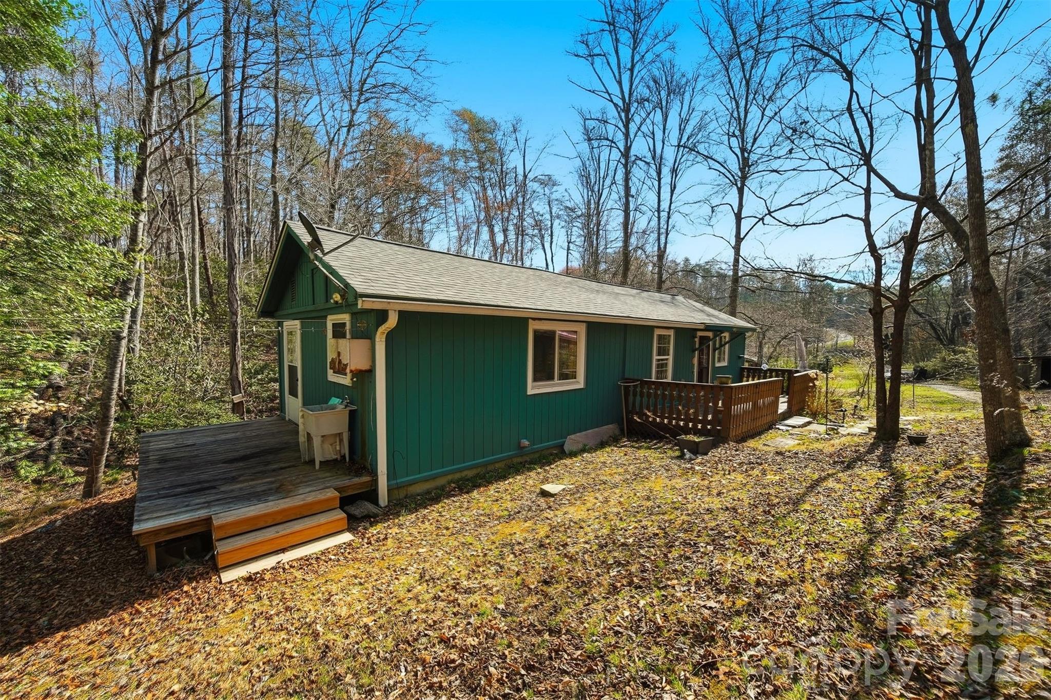 621 Wildlife Lake Road Old Fort, NC 28762 - Photo 26 of 35 a view of house with a yard