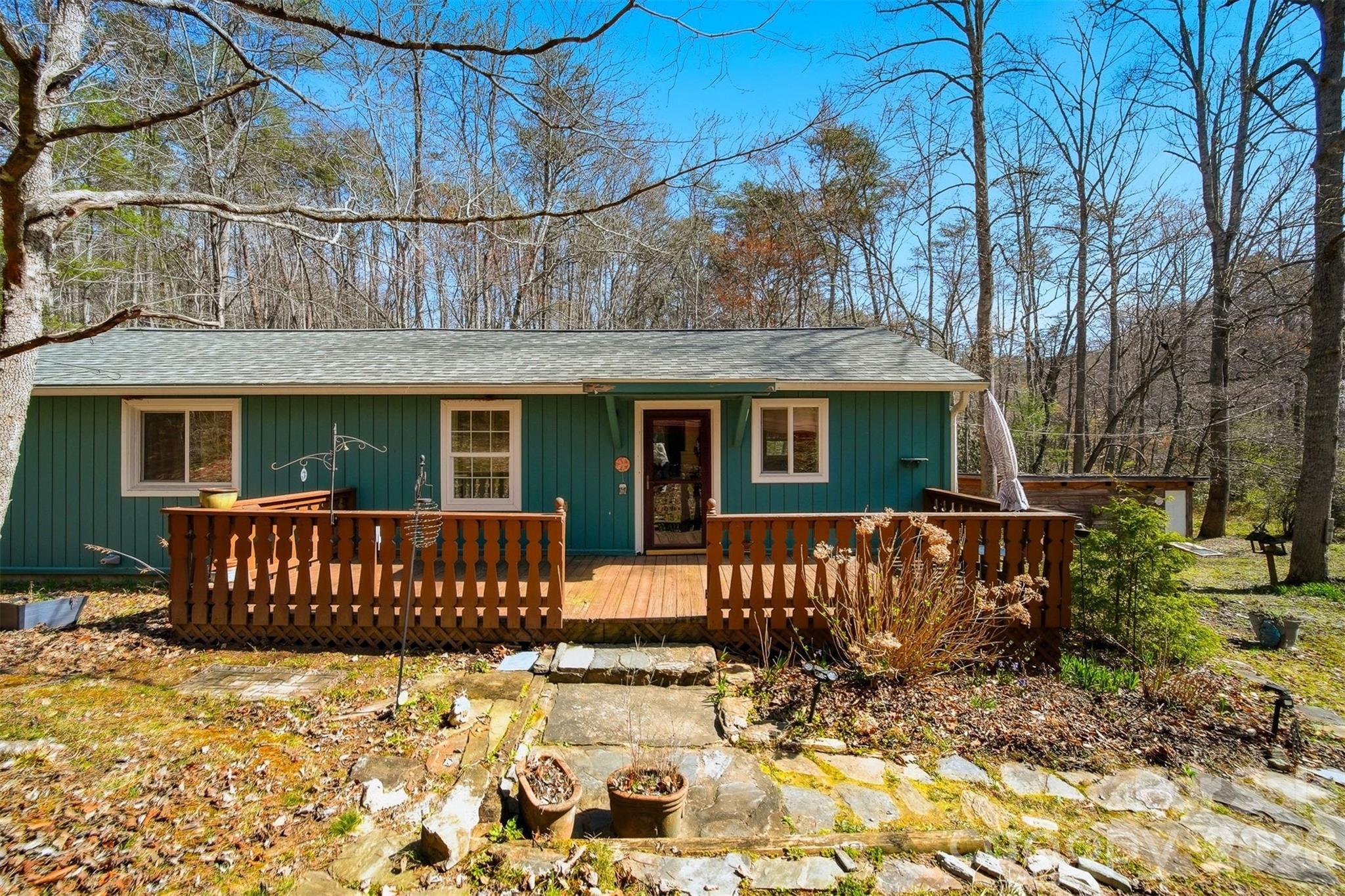 621 Wildlife Lake Road Old Fort, NC 28762 - Photo 3 of 35 a front view of a house with a yard