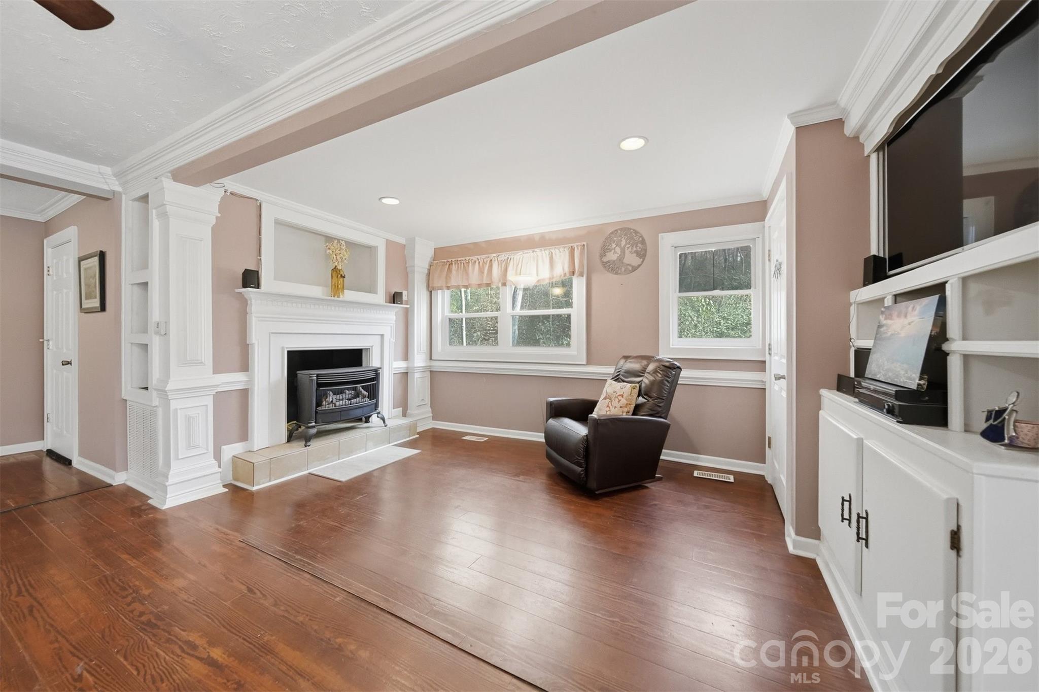 621 Wildlife Lake Road Old Fort, NC 28762 - Photo 7 of 35 a living room with furniture fireplace and flat screen tv