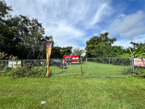 a view of a park and entertaining space