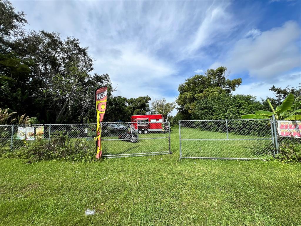 a view of a park and entertaining space