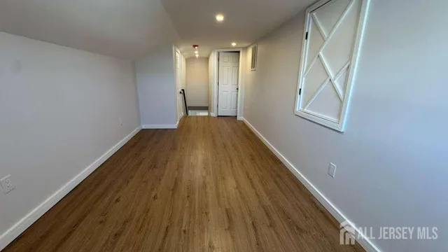 a bathroom with a glass shower door