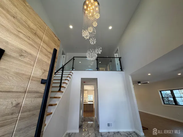a view of a hallway with windows