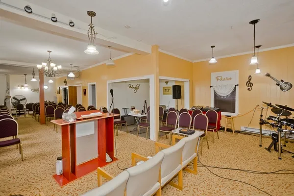 a view of a living room and kitchen