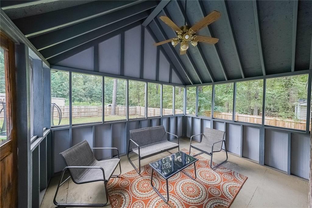 820 Bridgewater Way Southeast Conyers, GA 30094 - Photo 15 of 19 a living room with furniture and a large window