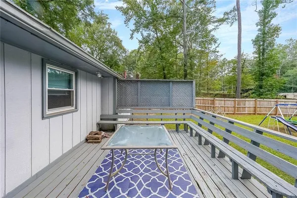 a view of a swimming pool with a lounge chairs