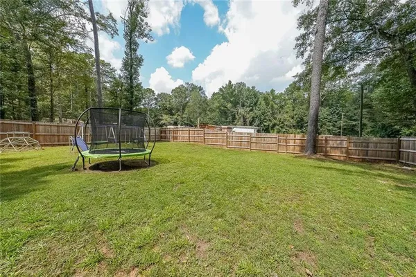a view of a park with swings