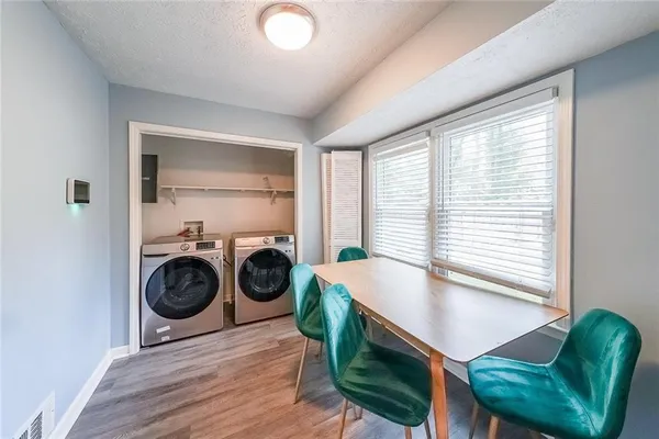 a view of a room with washer and dryer
