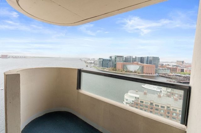 a bathroom with a sink and mirror with painted walls