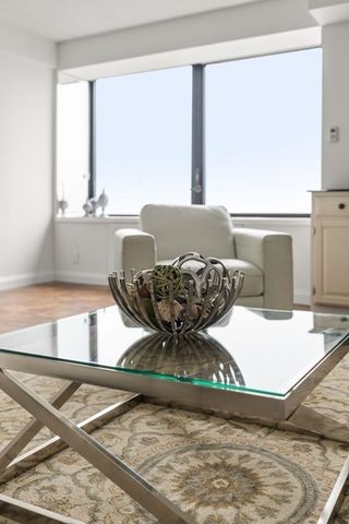 a view of a living room with a rug