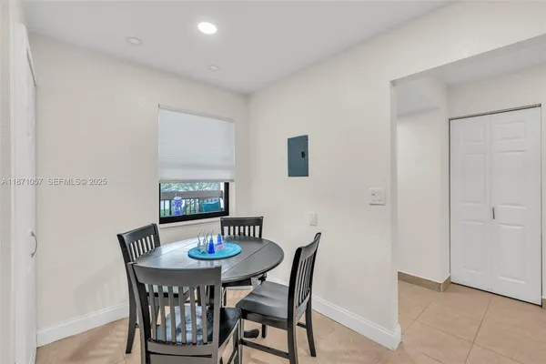 a view of a dining room with furniture
