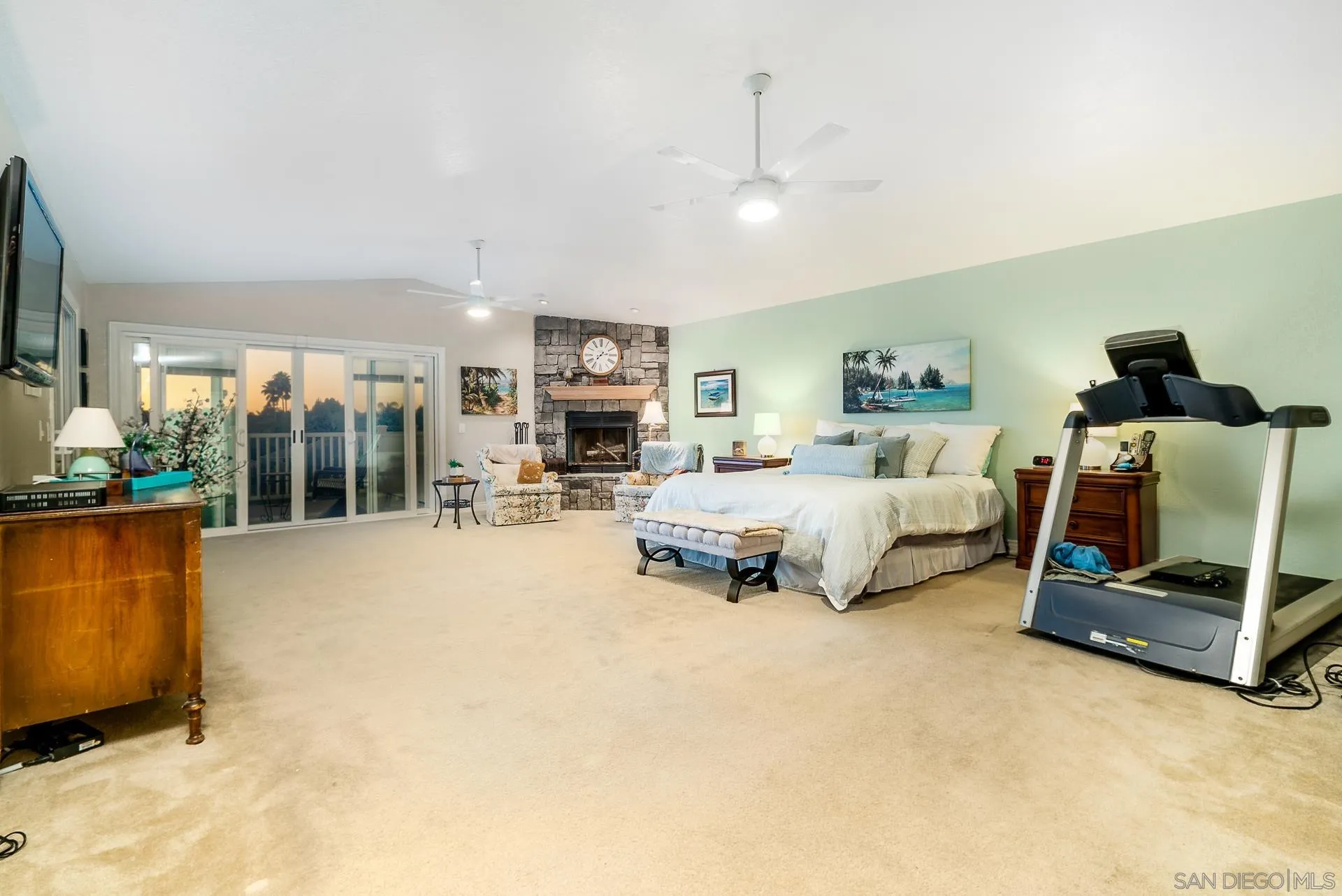 3909 Palomar Drive Fallbrook, CA 92028 - Photo 12 of 43 a bed room with furniture and a chandelier