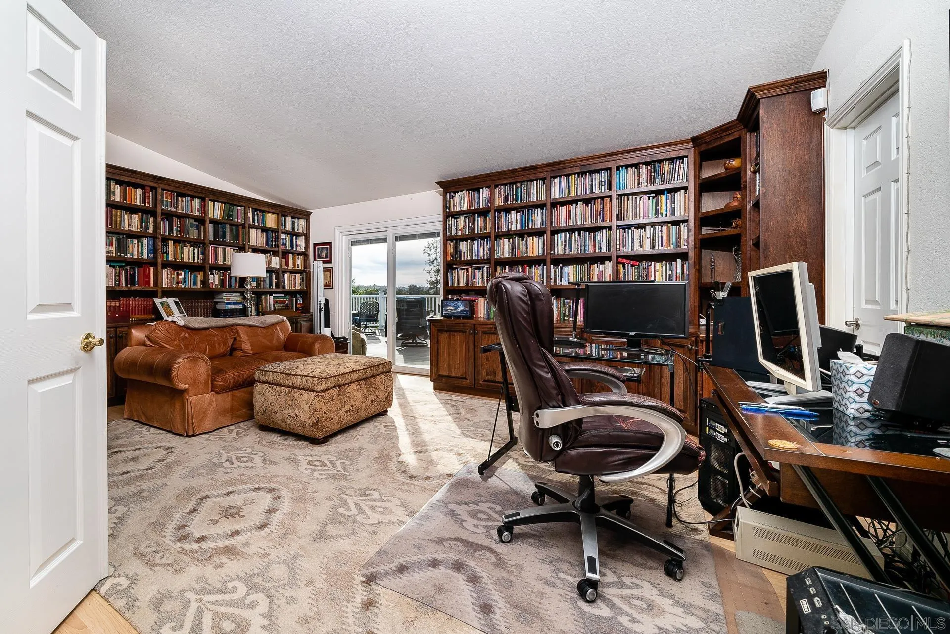 3909 Palomar Drive Fallbrook, CA 92028 - Photo 16 of 43 a view of a workspace with furniture and a window