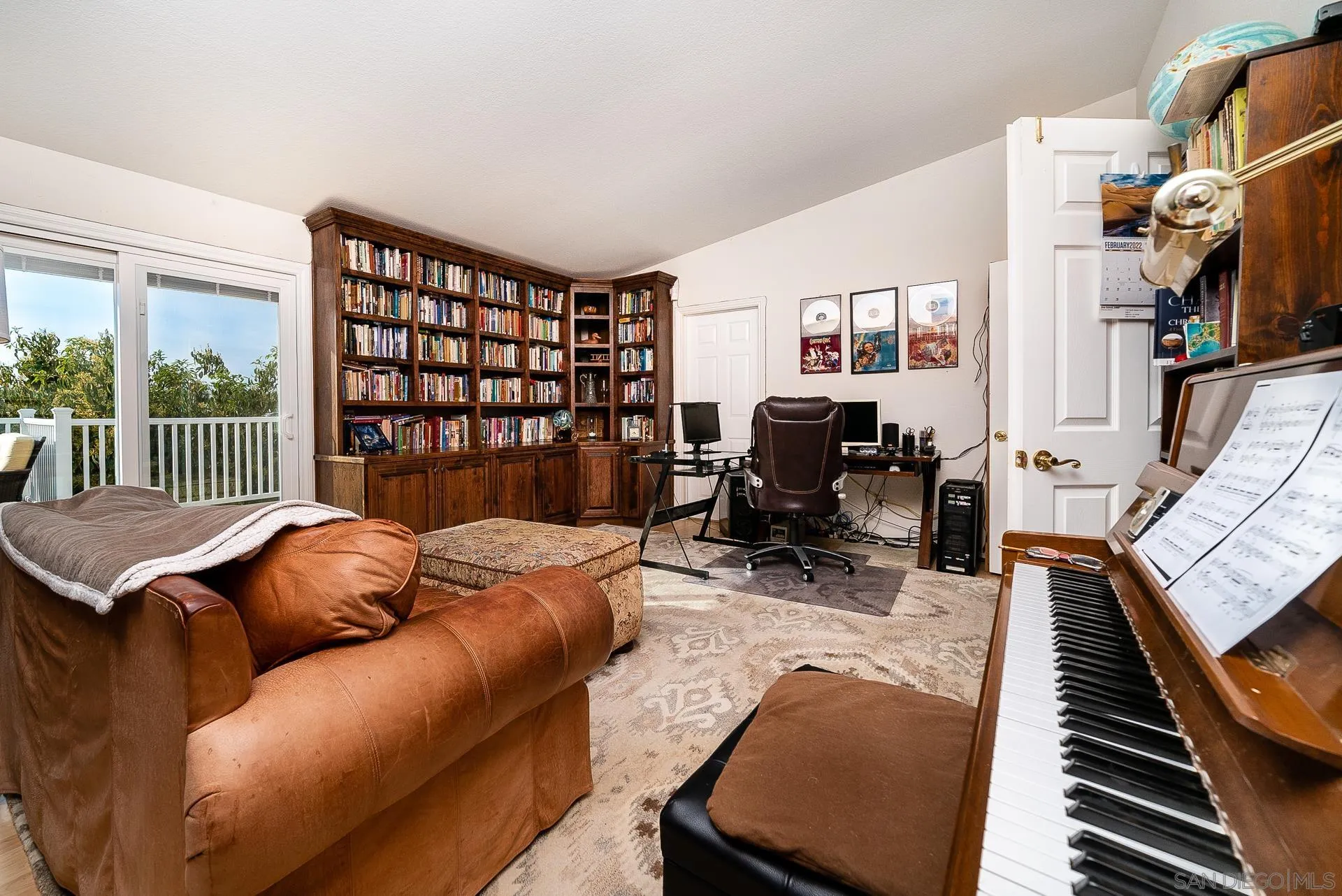 3909 Palomar Drive Fallbrook, CA 92028 - Photo 17 of 43 a reading room with furniture and a book shelf