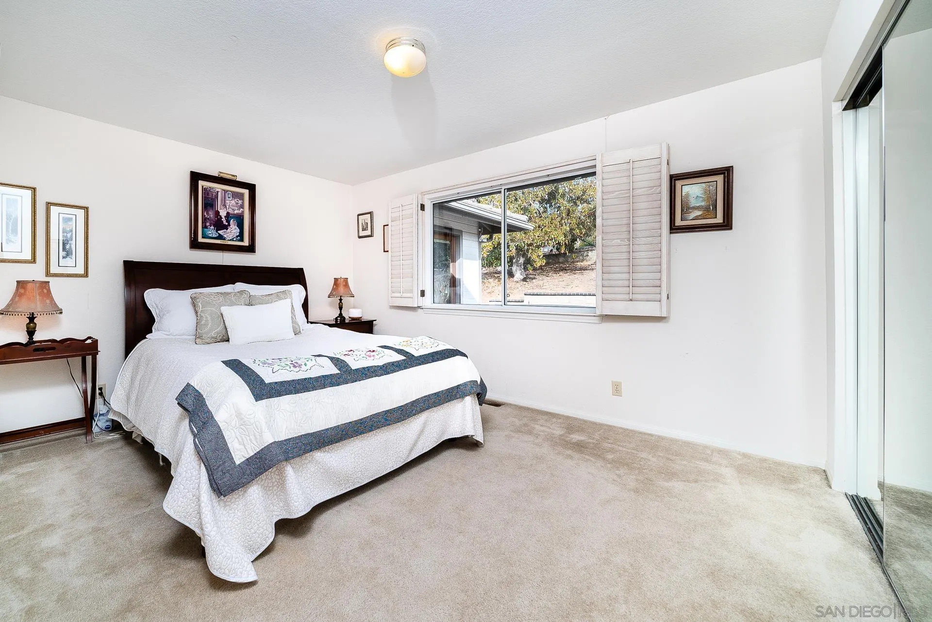 3909 Palomar Drive Fallbrook, CA 92028 - Photo 18 of 43 a bedroom with a bed and a window