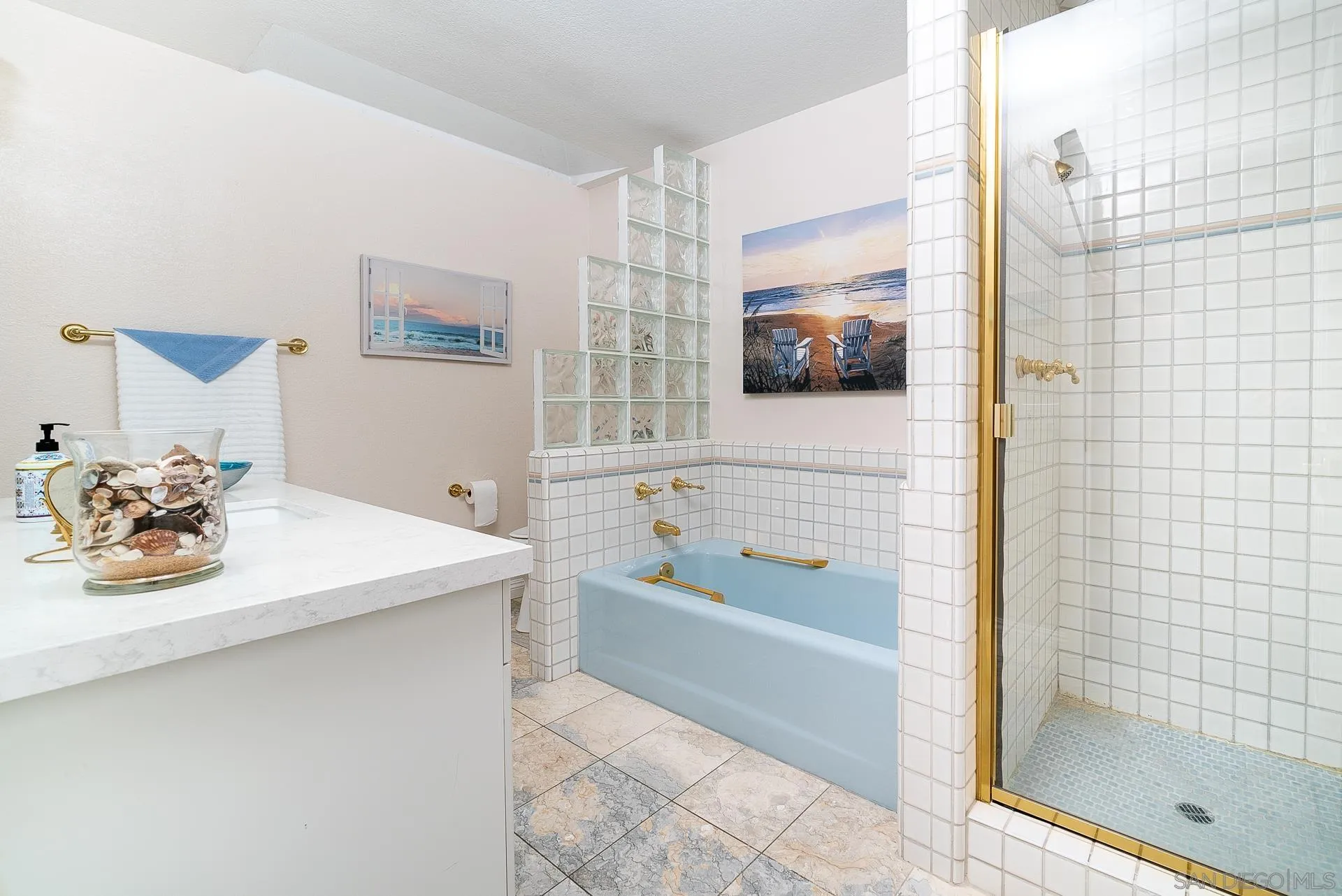 3909 Palomar Drive Fallbrook, CA 92028 - Photo 22 of 43 a bathroom with a sink a bathtub and a shower