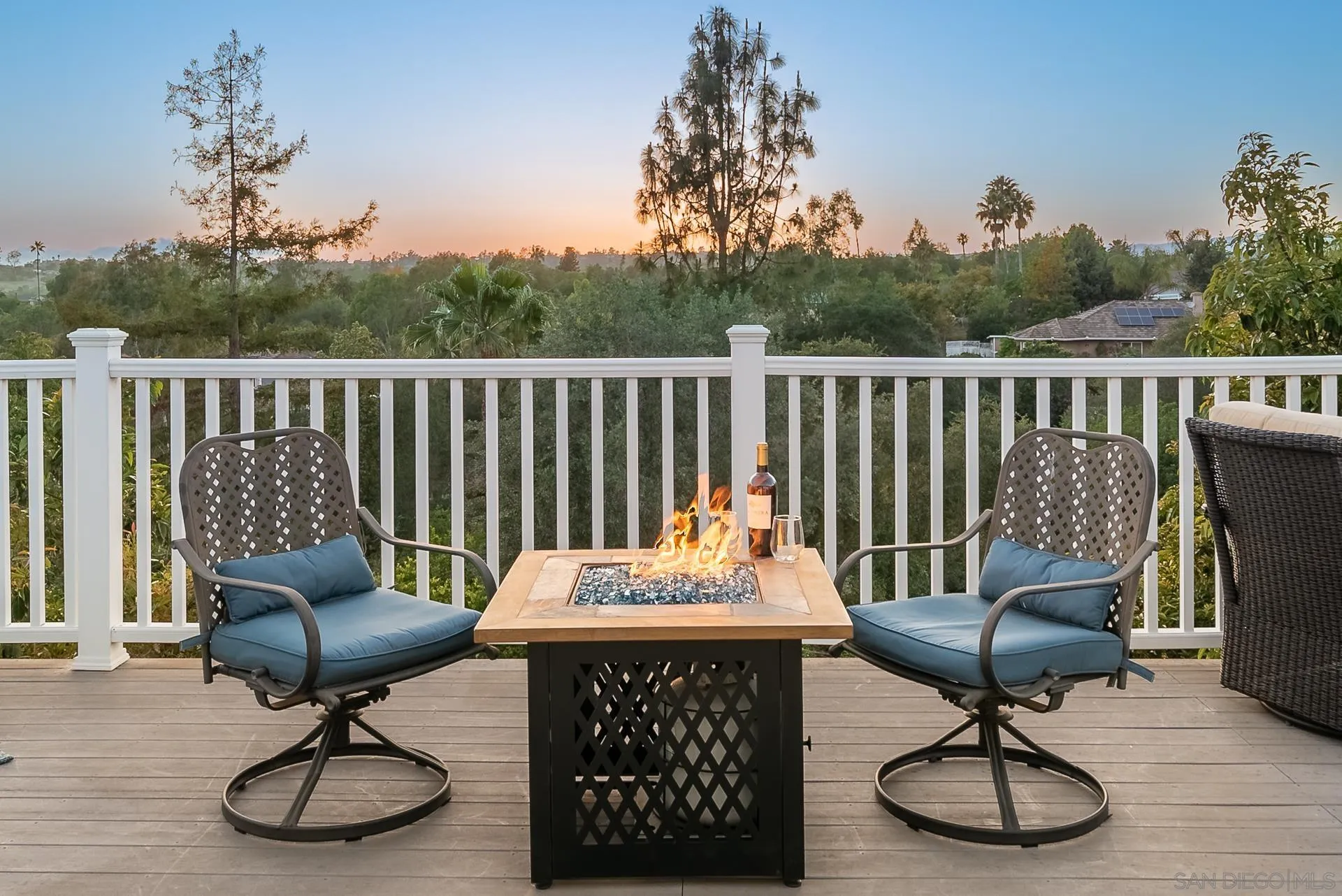 3909 Palomar Drive Fallbrook, CA 92028 - Photo 27 of 43 a view of a chairs and tables in the back yard of the house