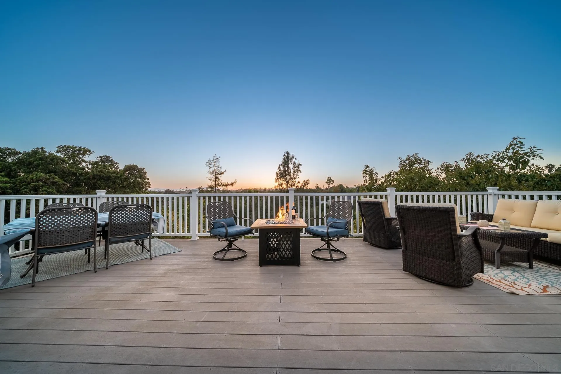 3909 Palomar Drive Fallbrook, CA 92028 - Photo 29 of 43 a view of a terrace with couches and wooden floor