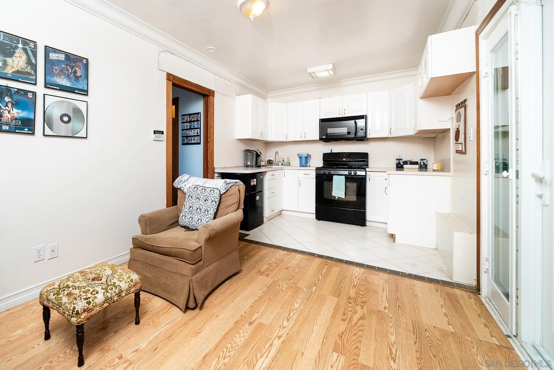 3909 Palomar Drive Fallbrook, CA 92028 - Photo 33 of 43 a kitchen with stainless steel appliances kitchen island granite countertop a refrigerator and a sink