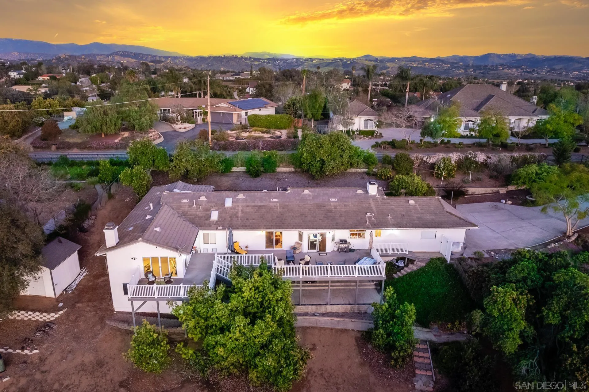 3909 Palomar Drive Fallbrook, CA 92028 - Photo 4 of 43 an aerial view of a house with a garden
