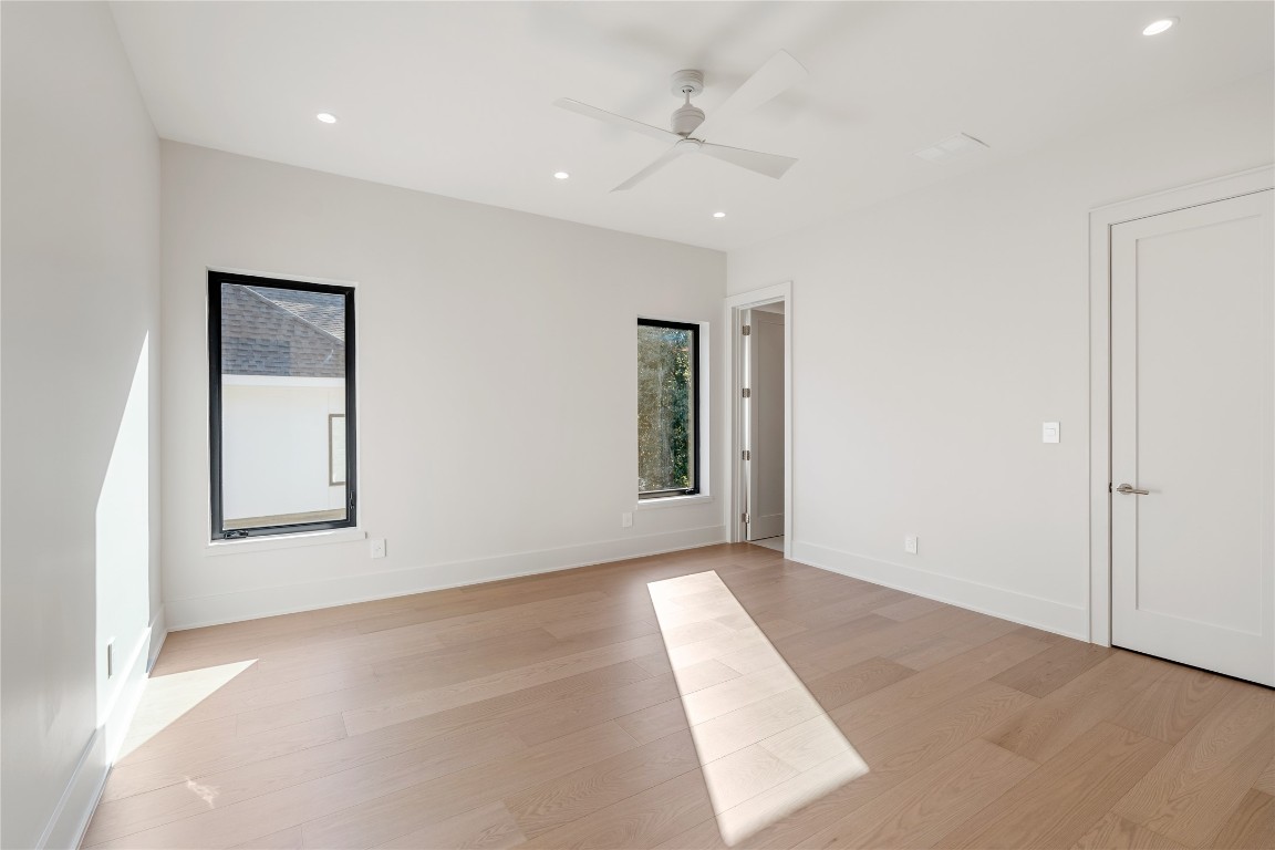 3802 Westerman Street Houston, TX 77005 - Photo 13 of 18 an empty room with windows and closet