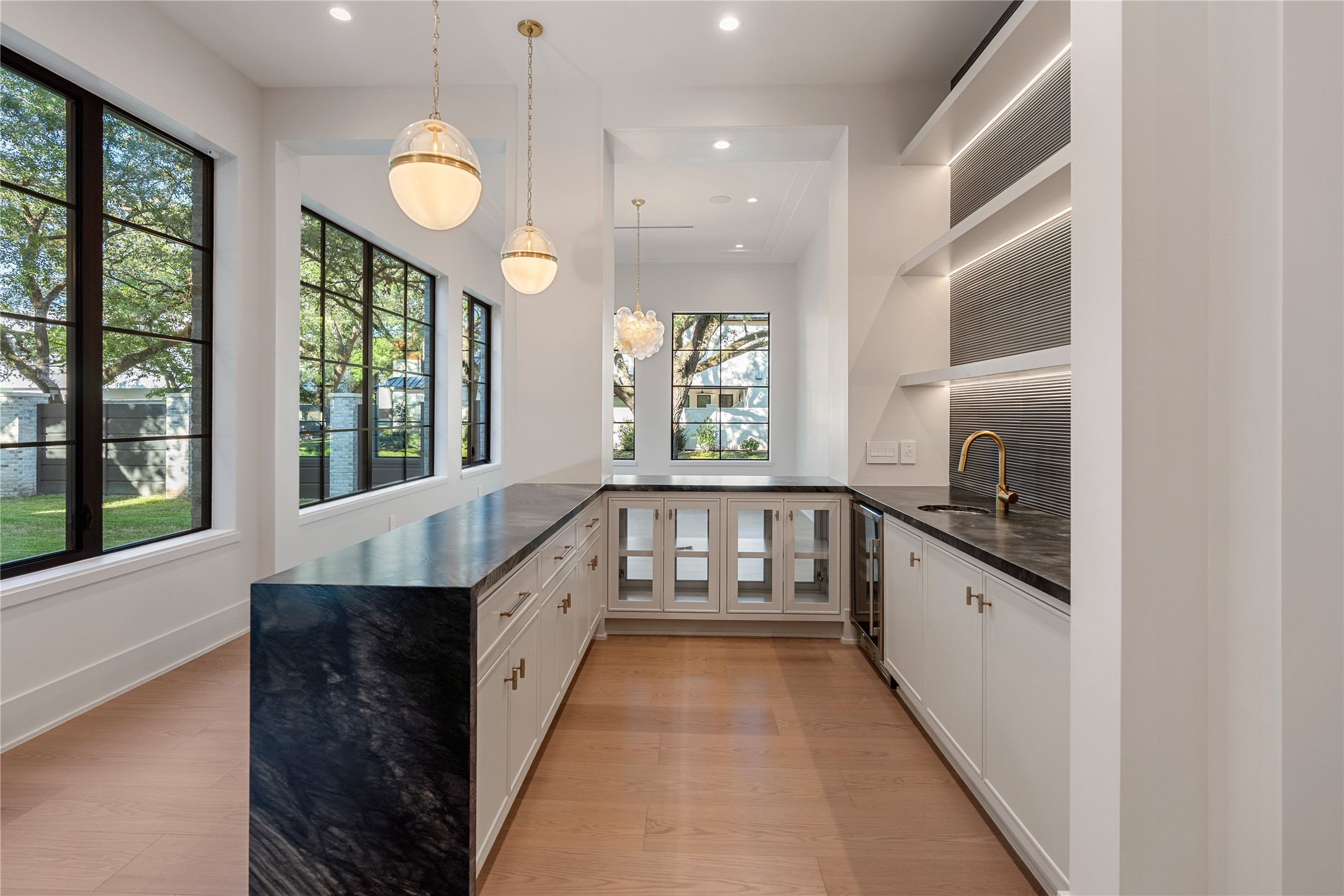 3802 Westerman Street Houston, TX 77005 - Photo 4 of 18 a large white kitchen with granite countertop a large window