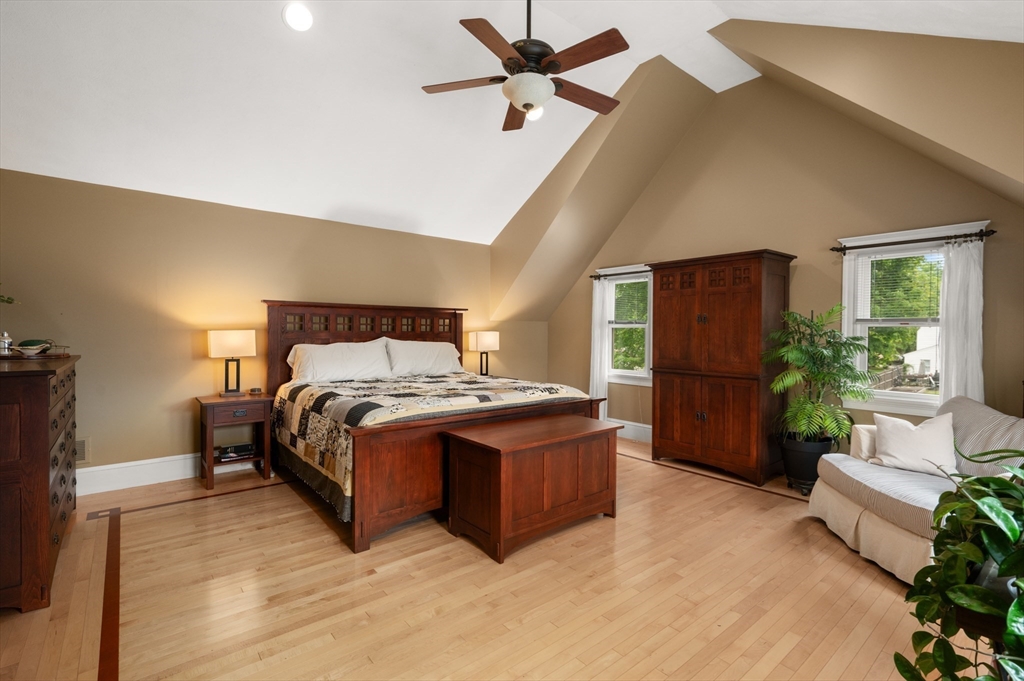 7 Charles Street Danvers, MA 01923 - Photo 13 of 37 a bed sitting in a spacious bedroom next to a window