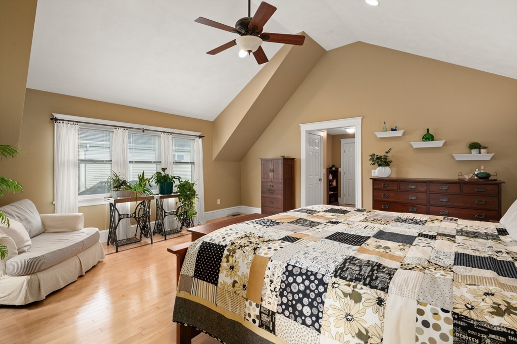 7 Charles Street Danvers, MA 01923 - Photo 14 of 37 a bedroom with a bed and a couch