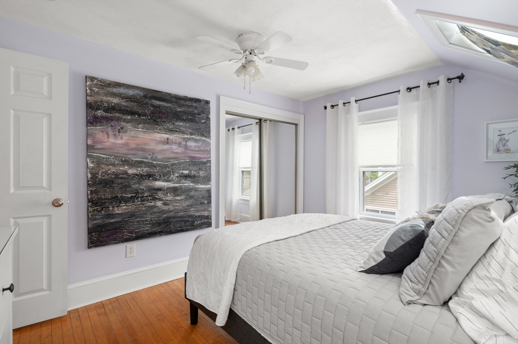 7 Charles Street Danvers, MA 01923 - Photo 18 of 37 a bedroom with a large bed and a window