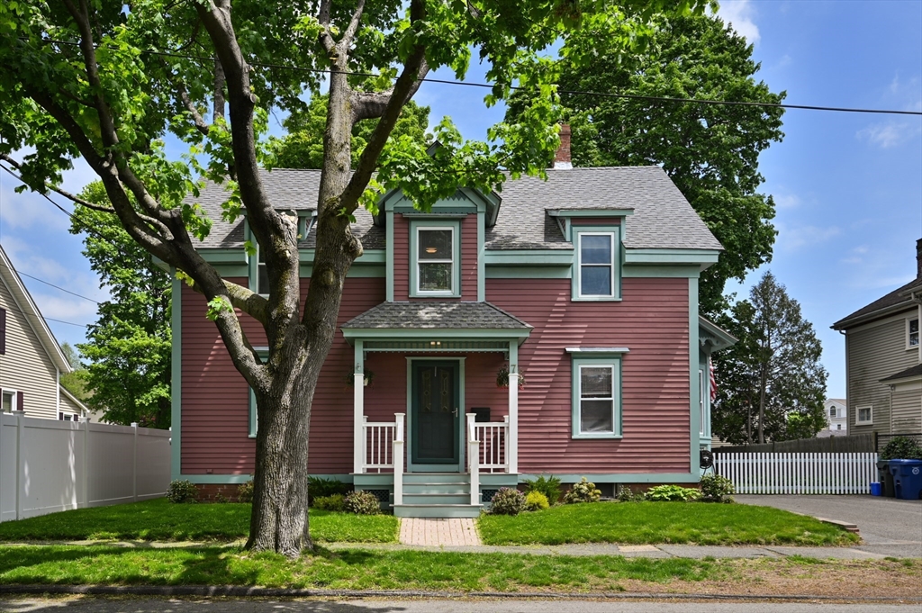 7 Charles Street Danvers, MA 01923 - Photo 25 of 37 front view of a house with a yard