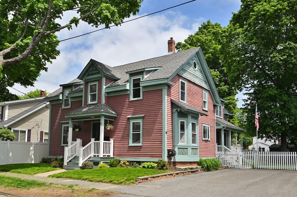 7 Charles Street Danvers, MA 01923 - Photo 27 of 37 a front view of a house with a yard