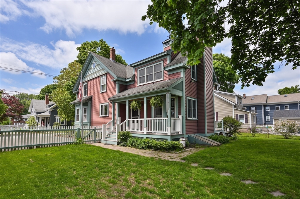 7 Charles Street Danvers, MA 01923 - Photo 28 of 37 a front view of a house with a yard