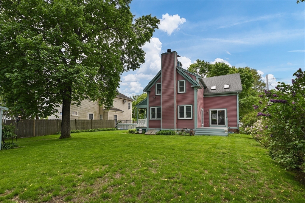 7 Charles Street Danvers, MA 01923 - Photo 33 of 37 a view of a house with a yard