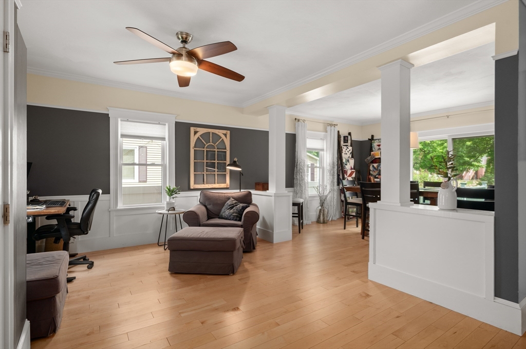 7 Charles Street Danvers, MA 01923 - Photo 10 of 37 a living room with furniture and a flat screen tv