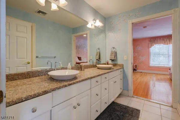 a bathroom with a toilet and shower