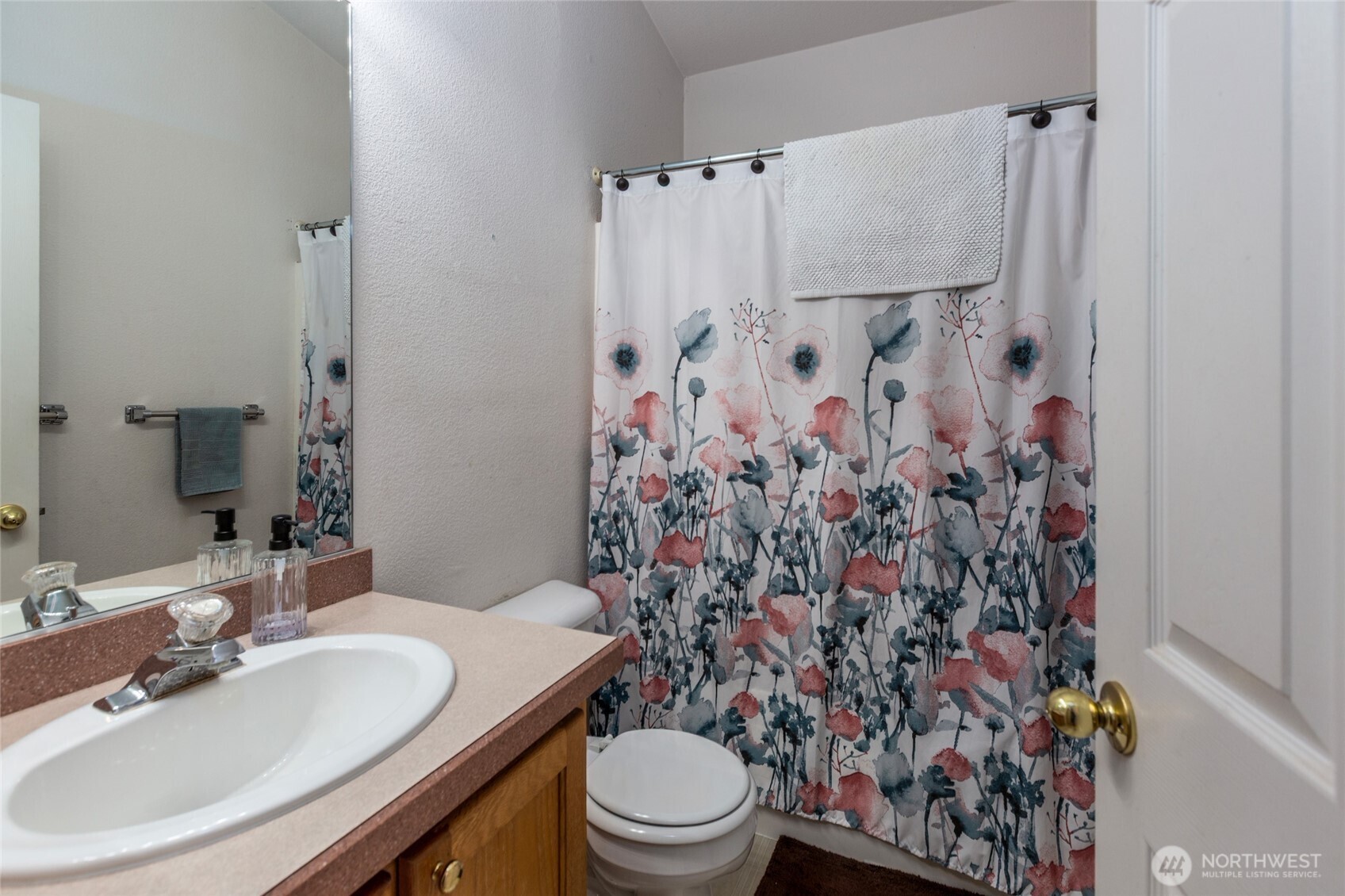 1785 Douglas Road, Unit 30 Friday Harbor, WA 98250 - Photo 18 of 32 a bathroom with a sink toilet and shower